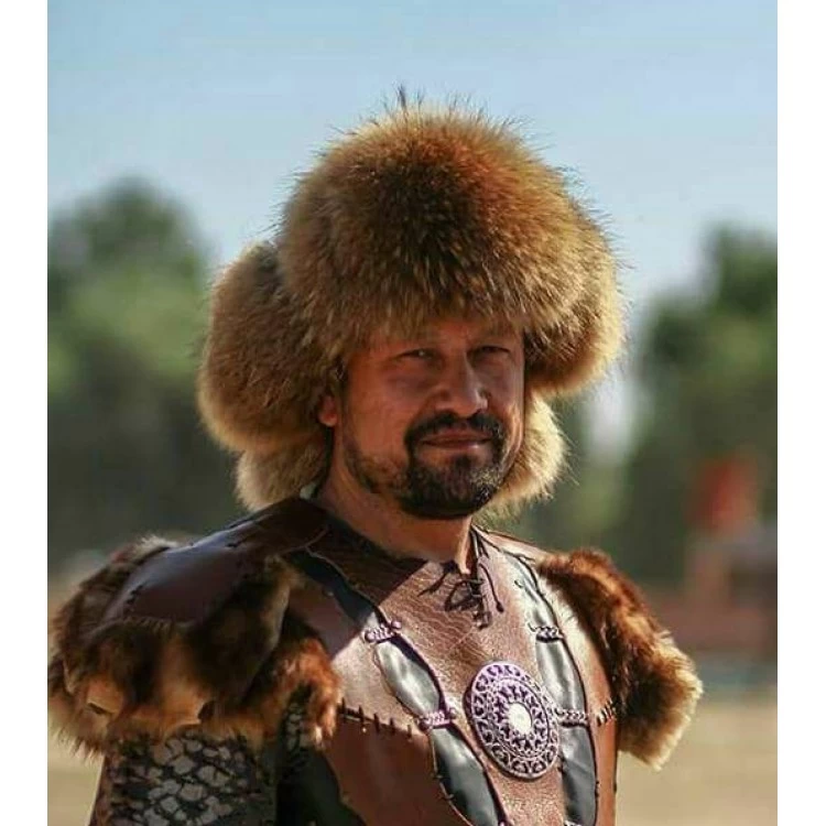 Mongolian fur hat Ş063 made with genuine raccoon fur, lamb leather and a detachable raccoon tail