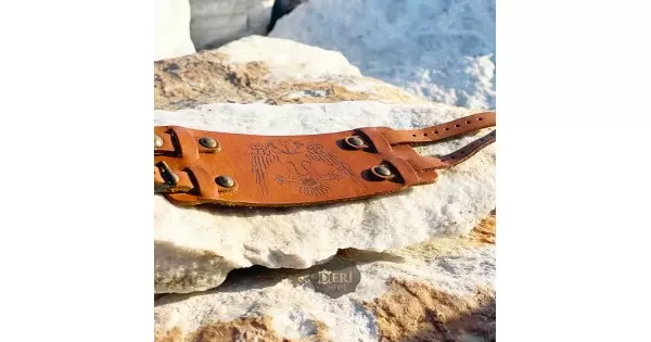 Real DeriSitesi BK102 Seljuk Peace Eagle wide genuine leather bracelet with two adjustable straps, approximately 2.4 inches (6 cm) wide