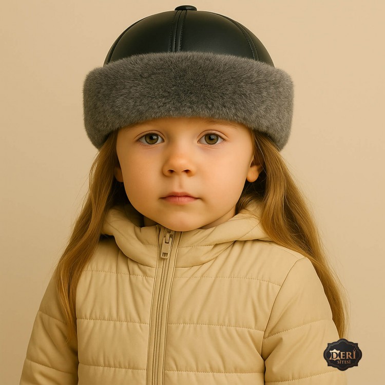 Girls’ Leather Fur Hat – Handmade Winter Hat with Gray Lamb Fur Girls' winter hat with black leather top and grey sheepskin fur trim – full sheepskin lining