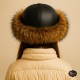 Girls’ Faux Fur Sheepskin Hat – Winter Leather Cap Girls’ winter hat with black lamb leather top, faux wolf fur trim, and natural sheepskin lining